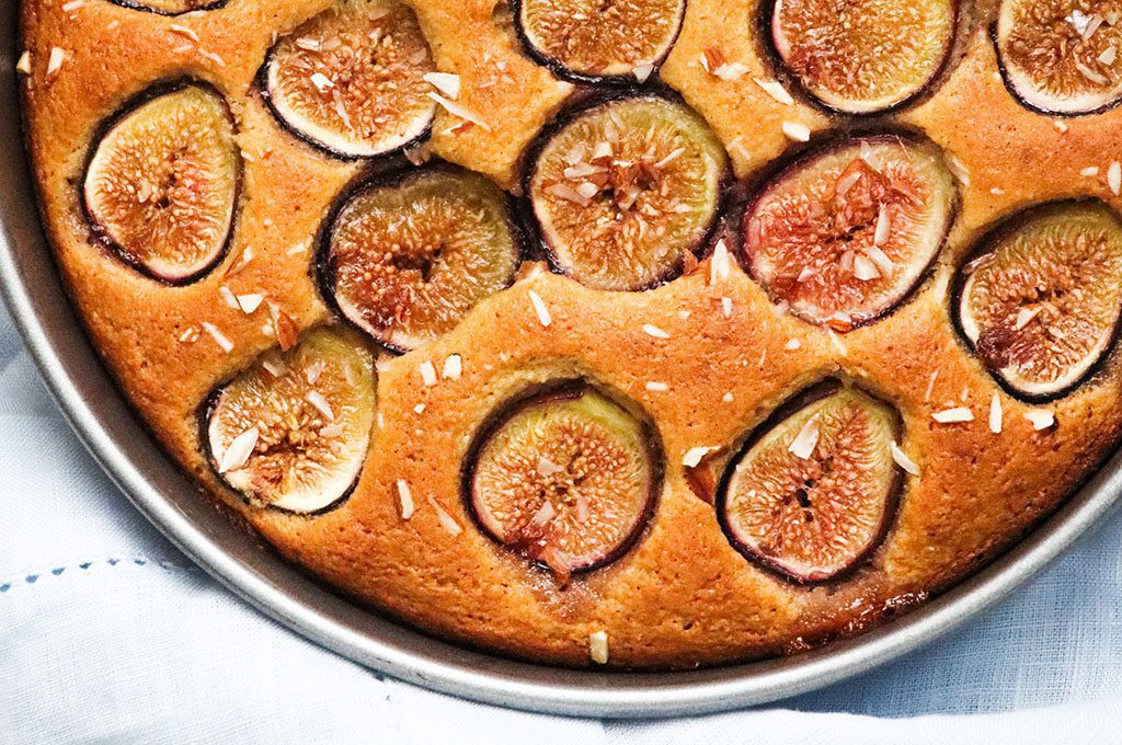 Fig and ginger cake sitting in a cake tin