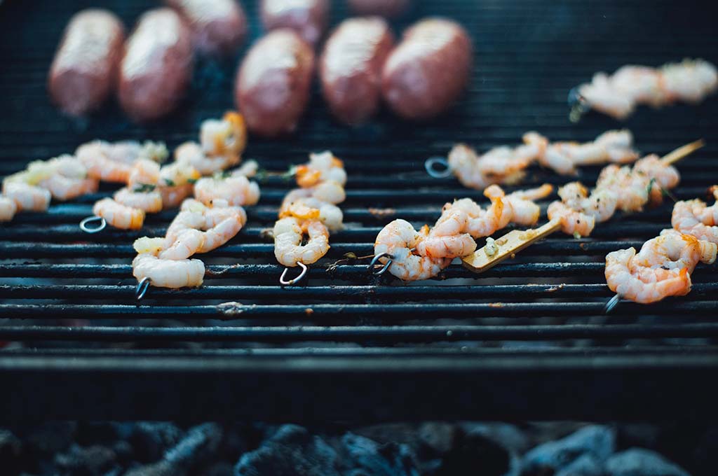 Prawns and chorizo cooking on a bbq